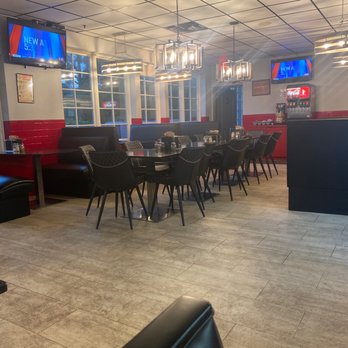 I Love NY Pizza - a dining area with tables and chairs - Italian Near Me - Alpharetta, Georgia I Love NY Pizza - a dining area with tables and chairs - Italian Near Me - Alpharetta, Georgia