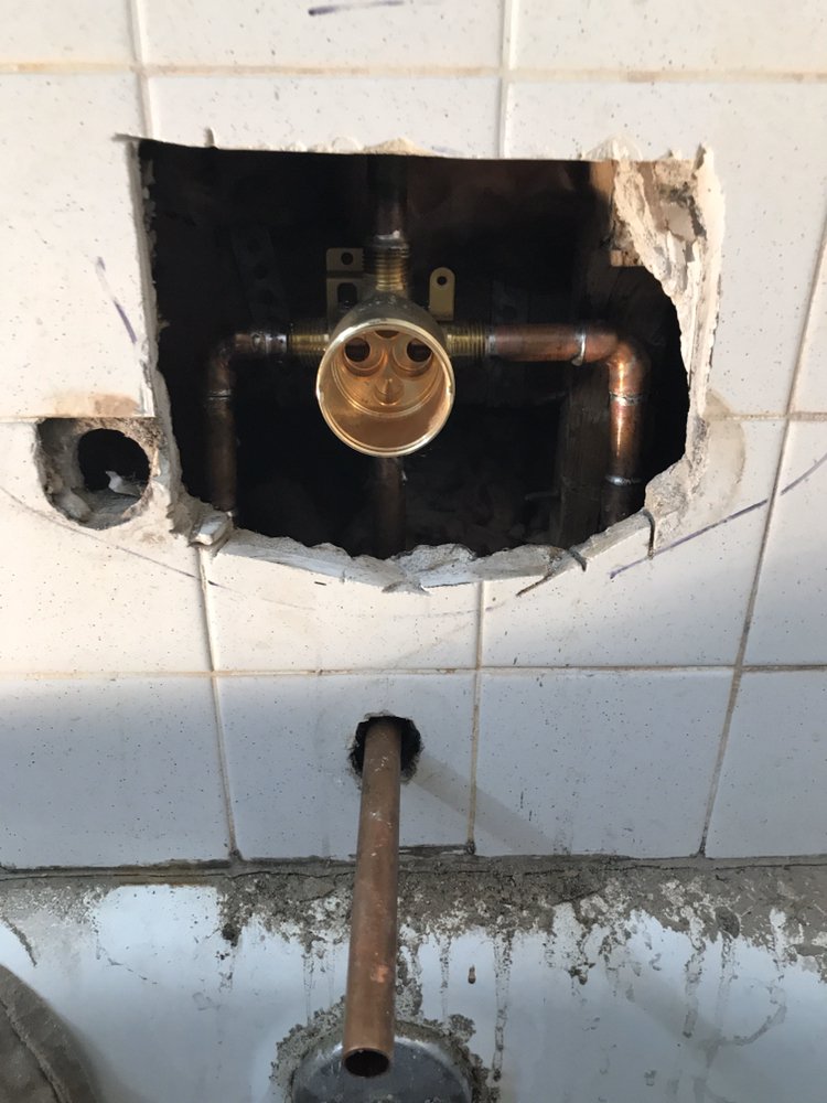 Slide of TJP Plumbing