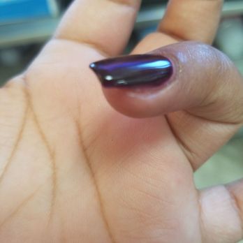 Ivy's Nails - The finger she cut and then put a drying agent - Nail Salons Near Me - Ventura, California