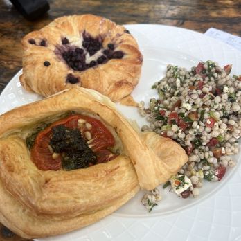 Kentucky Native Cafe - Top: blueberry cream cheese pastry; bottom: tomato pesto & parm pastry; right: couscous with almond & feta - Cafes Near Me - Lexington, Kentucky Kentucky Native Cafe - Top: blueberry cream cheese pastry; bottom: tomato pesto & parm pastry; right: couscous with almond & feta - Cafes Near Me - Lexington, Kentucky
