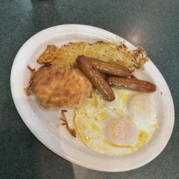 Hashbrowns, Over easy eggs, biscuit, and turkey sausage Two Egg Breakfast