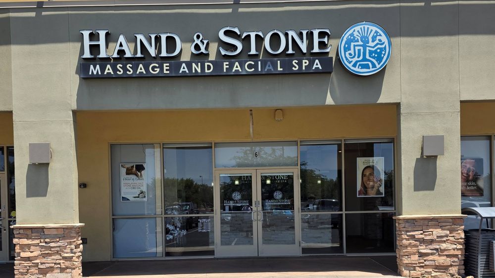 Hand & Stone Massage and Facial Spa Logo
