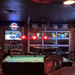 Maggie's Rumble Room - Pool table and garage door access to patio