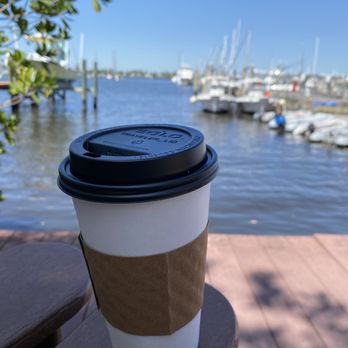 Gilbert's Coffee Bar - Sunset Bay - Enjoying a coffee outside on their Adirondack chairs. - Coffee & Tea Near Me - Stuart, Florida Gilbert's Coffee Bar - Sunset Bay - Enjoying a coffee outside on their Adirondack chairs. - Coffee & Tea Near Me - Stuart, Florida