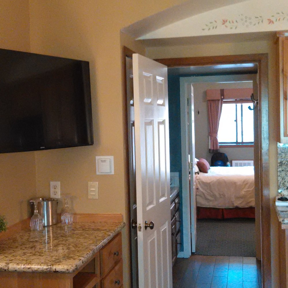 Olympic Village Inn - looking toward bedroom from kitchen - Hotels Near Me - Olympic Valley, California