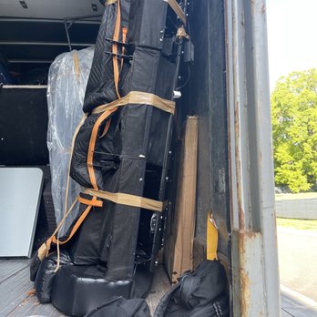 Green Line Relocation and Systems - Leather recliner packed on top of TV! - Movers Near Me - Baltimore, Maryland Green Line Relocation and Systems - Leather recliner packed on top of TV! - Movers Near Me - Baltimore, Maryland