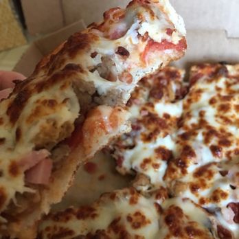 LaRocca's Pizza - The meat pizza is missing sauce (important part of the process) and too much salt content, perhaps because of all the meats? IDK.. - Pizza Near Me - Topeka, Kansas