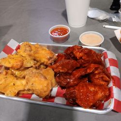Tipsy Bar & Grill - This was garlic parmesan , and Tennessee. Hot wings they were really good.