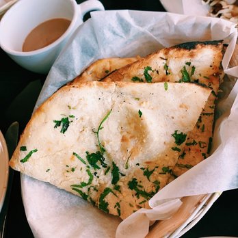 Taj - Indian Cuisine - Garlic Naan - Indian Near Me - Melbourne, Florida Taj - Indian Cuisine - Garlic Naan - Indian Near Me - Melbourne, Florida