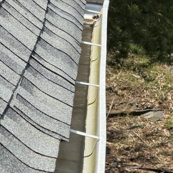 Guy Roofing - Improperly installed drip edges causing warped shingles 4 years later - Roofing Near Me - Spartanburg, South Carolina