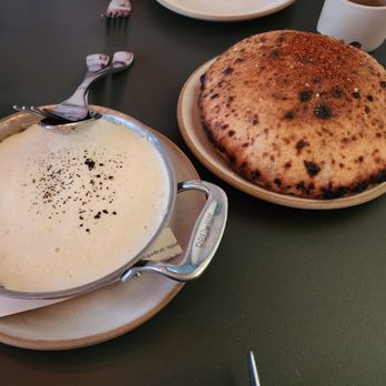 Bistro Lagniappe - Spring Onion Gratin with Comté. Wood fired flat bread. - Wine Bars Near Me - Healdsburg, California Bistro Lagniappe - Spring Onion Gratin with Comté. Wood fired flat bread. - Wine Bars Near Me - Healdsburg, California