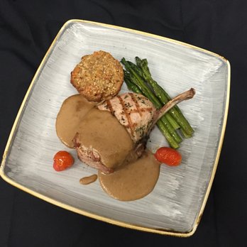 Urban South Dine - Texas Pork Chop, French Cut, with Sweet Potato Souffle, Caramelized Apple Sauce, and Grilled Asparagus. - New American Near Me - Dallas, Texas Urban South Dine - Texas Pork Chop, French Cut, with Sweet Potato Souffle, Caramelized Apple Sauce, and Grilled Asparagus. - New American Near Me - Dallas, Texas