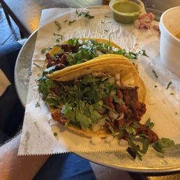 Al pastor Mexican street tacos with elote, halfway done. Al pastor Mexican street tacos with elote, halfway done.