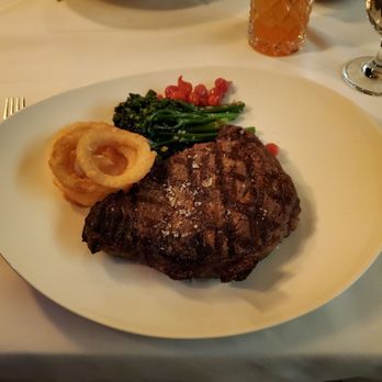The David Duncan House - Rib eye steak 16oz with brocollini and onion rings - Canadian (New) Near Me - North York, Ontario The David Duncan House - Rib eye steak 16oz with brocollini and onion rings - Canadian (New) Near Me - North York, Ontario