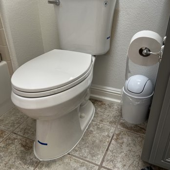NG Rooter & Plumbing - Replacing old toilet seat with new - Plumbing Near Me