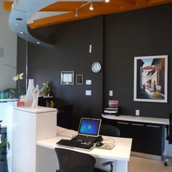Chompers Family Dental - Warm vibrant colors, beautiful reception area.