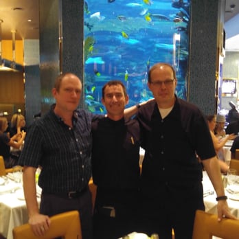 Chart House - Us with our waiter, Harris. The giant aquarium behind us is the focal point of the restaurant. - Seafood Near Me - Las Vegas, Nevada Chart House - Us with our waiter, Harris. The giant aquarium behind us is the focal point of the restaurant. - Seafood Near Me - Las Vegas, Nevada