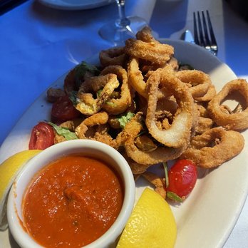 The Florentine Cafe - Calamari Fritti- fried perfectly along with banana peppers perfectly seasoned - Italian Near Me - Boston, Massachusetts The Florentine Cafe - Calamari Fritti- fried perfectly along with banana peppers perfectly seasoned - Italian Near Me - Boston, Massachusetts