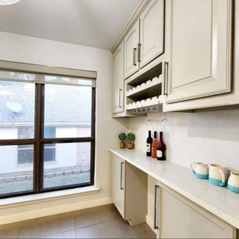 CityView Enterprises - a kitchen with white cabinets and white countertops - General Contractors Near Me CityView Enterprises - a kitchen with white cabinets and white countertops - General Contractors Near Me