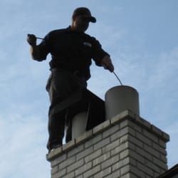 Clean Sweep Chimney & Dryer Vent Service - Chimney being cleaned