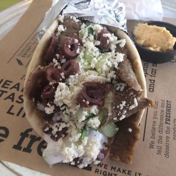 Gyroville - Gyro Pita with Kalamata olives,Tzatziki sauce, feta, & cucumbers - Greek Near Me - Miami, Florida Gyroville - Gyro Pita with Kalamata olives,Tzatziki sauce, feta, & cucumbers - Greek Near Me - Miami, Florida