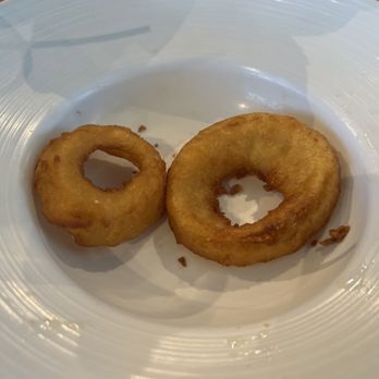 Sunrise Grill - What was left of our onion rings. It was a large serving and we ate a bunch. - Bars Near Me - Jekyll Island, Georgia Sunrise Grill - What was left of our onion rings. It was a large serving and we ate a bunch. - Bars Near Me - Jekyll Island, Georgia
