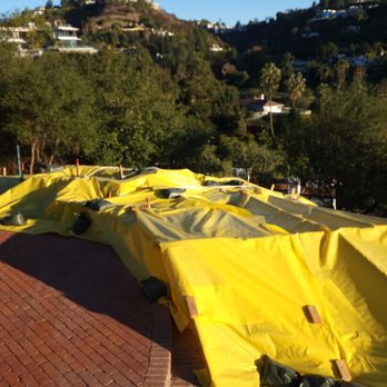 Foundation Repair LA - tarped hillside with sandbags and stakes - Foundation Repair Near Me - Los Angeles, California Foundation Repair LA - tarped hillside with sandbags and stakes - Foundation Repair Near Me - Los Angeles, California
