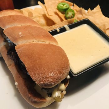 LeadBelly - Prime rib sandwich, Chips and queso - New American Near Me - Lincoln, Nebraska LeadBelly - Prime rib sandwich, Chips and queso - New American Near Me - Lincoln, Nebraska