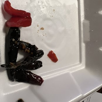 Panda Express - Super Hot Burnt (?Charred) Peppers that were in my Kung pow chicken. I had no idea they made it quite so spicy! - Chinese Near Me - Leander, Texas Panda Express - Super Hot Burnt (?Charred) Peppers that were in my Kung pow chicken. I had no idea they made it quite so spicy! - Chinese Near Me - Leander, Texas