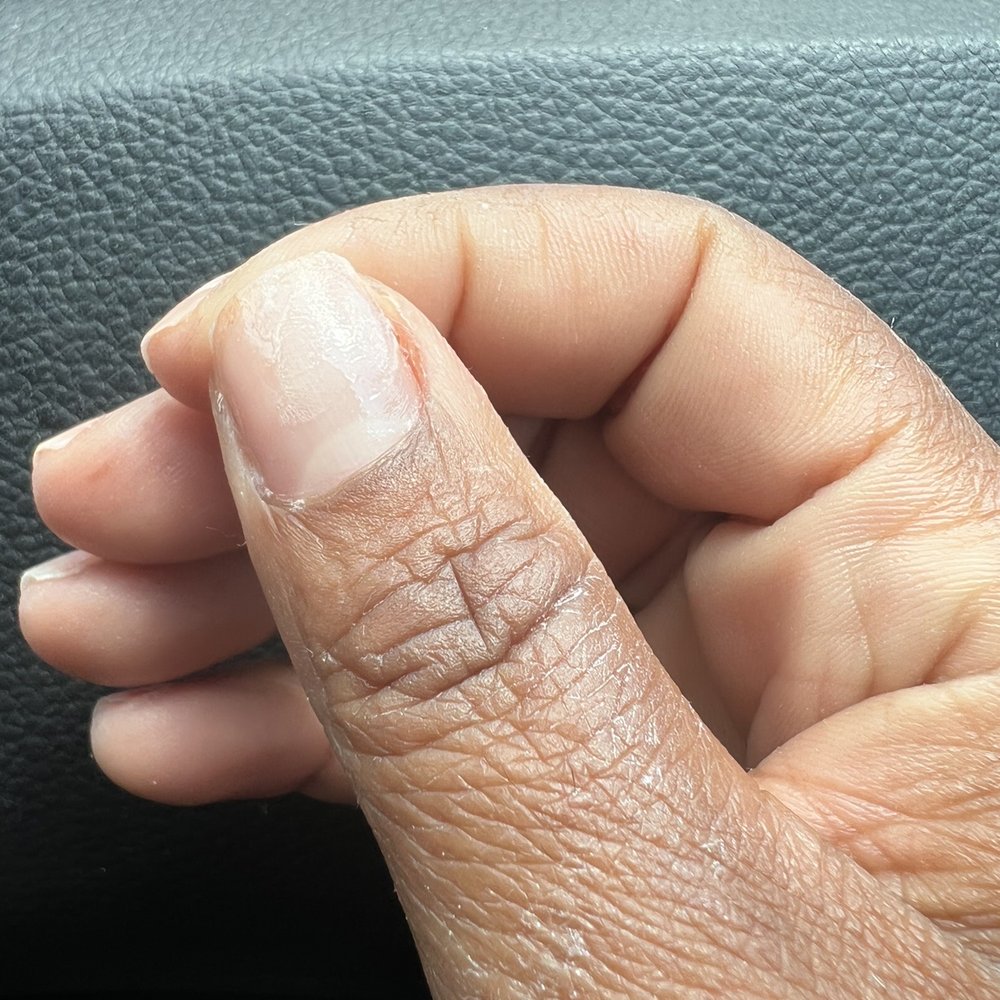 Luxury Nails and Spa - Product left all over skin - Nail Salons Near Me - Douglasville, Georgia
