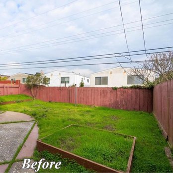 AXA Construction - Backyard with uneven grass, a red wooden fence, and overhead power lines. Looks unmaintained and needs landscaping. - General Contractors Near Me - Daly City, California AXA Construction - Backyard with uneven grass, a red wooden fence, and overhead power lines. Looks unmaintained and needs landscaping. - General Contractors Near Me - Daly City, California