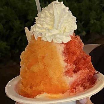 Uncle's Shave Ice - Vanilla ice cream at the bottom, tangerine, coconut and tigers blood syrup, topped with whipped cream. - Shaved Ice Near Me - Koloa, Hawaii Uncle's Shave Ice - Vanilla ice cream at the bottom, tangerine, coconut and tigers blood syrup, topped with whipped cream. - Shaved Ice Near Me - Koloa, Hawaii