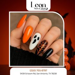Leon Nails & Lash - Dark tones with fine art details create hauntingly elegant nails. Step into the Halloween mood.  Book today