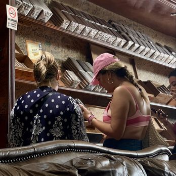 Top Cigars - Dunair educating customers on the cigar process. - Tobacco Shops Near Me - Miami, Florida Top Cigars - Dunair educating customers on the cigar process. - Tobacco Shops Near Me - Miami, Florida
