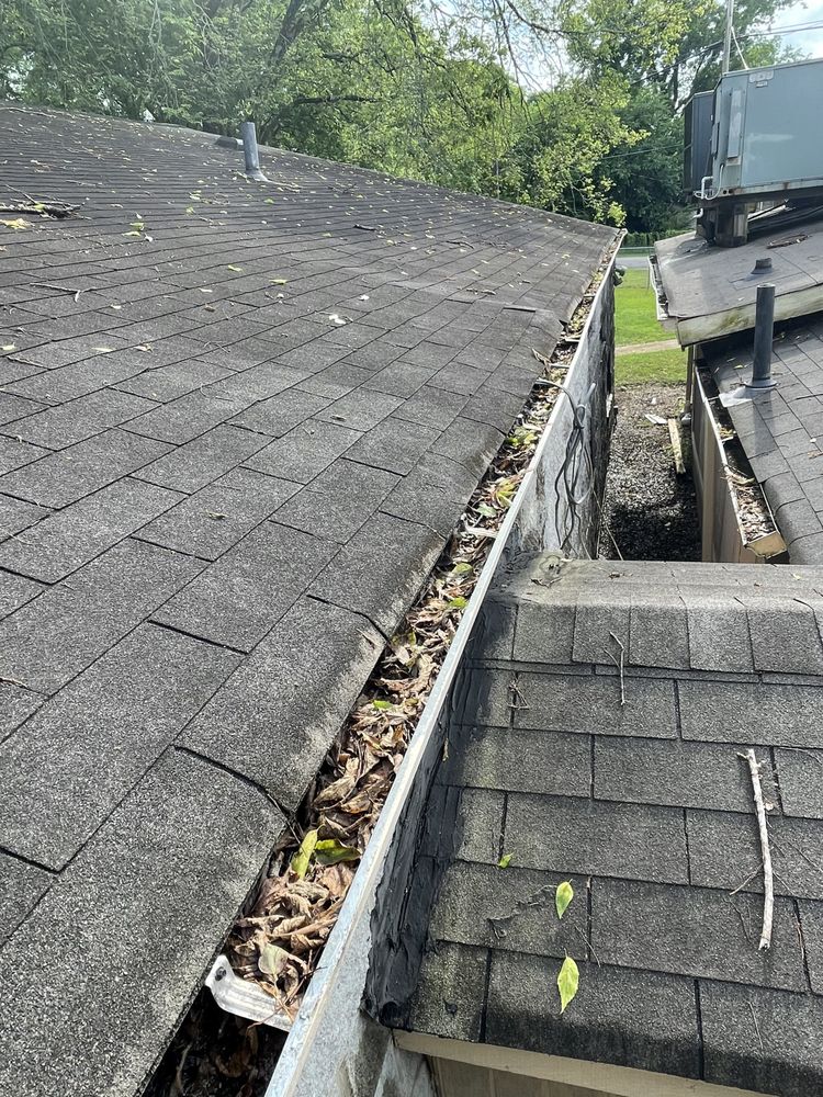 Slide of Marcus Gutters Cleaning