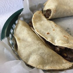 La Estrella - Steak tacos loaded up with fresh Pico, hot sauce, and tomato, cilantro, jalapeño onion mix with a squeeze of lime.  Tasty and fresh!