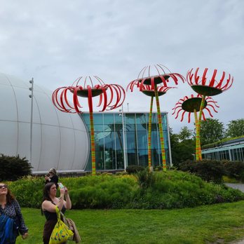 Seattle Center - Outside Chihuly Gardens and Glass. Flowers made with recycle materials - Amusement Parks Near Me - Seattle, Washington