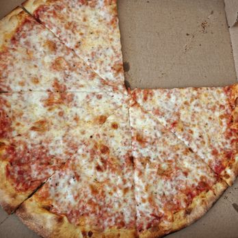 Grappelli's Craft Pizza - Cheese pizza, pillaged before shot - Pizza Near Me - Peterborough, New Hampshire Grappelli's Craft Pizza - Cheese pizza, pillaged before shot - Pizza Near Me - Peterborough, New Hampshire