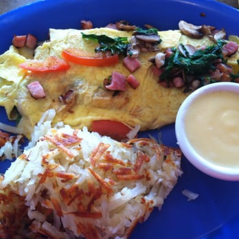 Chad's - Florentine Omelette with Hollandaise sauce on the side! - Breakfast & Brunch Near Me - Santa Barbara, California