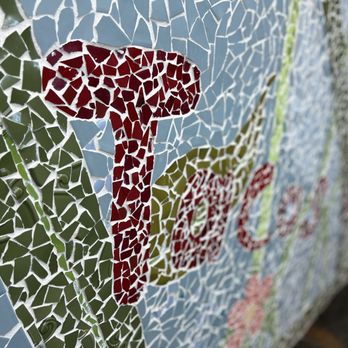 Tacos El Fluffy - a close up of a mosaic wall - Mexican Near Me - Pensacola, Florida