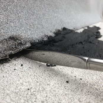 Urbach Roofing - The black tar was slapped on but left holes under each side. - Roofing Near Me - San Marcos, California Urbach Roofing - The black tar was slapped on but left holes under each side. - Roofing Near Me - San Marcos, California