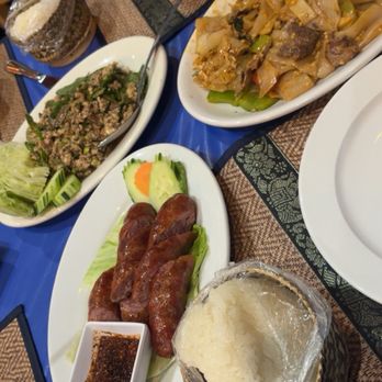 Pha Khao - Ordered lao sausage, Pad kee mao (drunken noodles), chicken laarb and sticky rice. - Thai Near Me - Kenosha, Wisconsin
