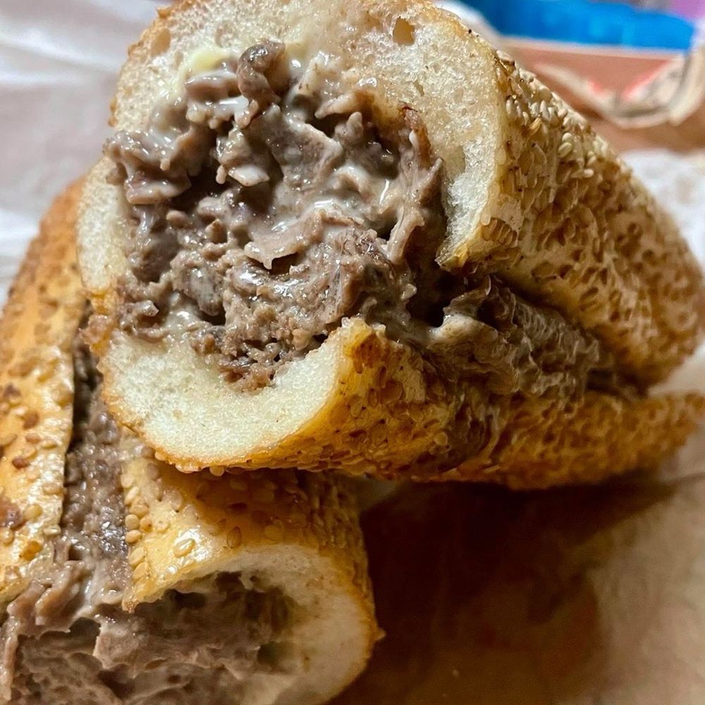 Cheesesteak on a seeded roll Cooper sharp cheese Cheesesteak on a seeded roll Cooper sharp cheese