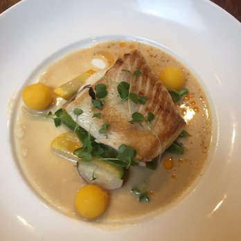 Au Comptoir - CABILLAUD roasted ling cod, summer vegetables, saffron potatoes, velouté, espelette oil. $28.00 - French Near Me - Vancouver, British Columbia