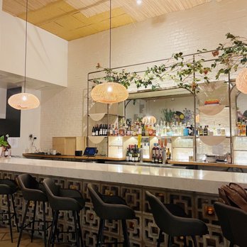 The Well - a bar with a lot of stools - Gluten-Free Near Me - Austin, Texas The Well - a bar with a lot of stools - Gluten-Free Near Me - Austin, Texas
