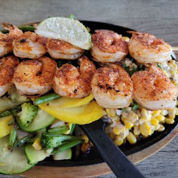 Maggie's R&R - Shrimp Skewers with roasted street corn and seasonal veggies. - American Near Me - Fort Worth, Texas