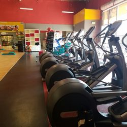 Ultimate Fitness - Across from the Group Class section, the ellipticals and stationary bikes.