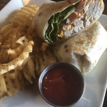 Valhalla Pub and Eatery - Chipotle turkey wrap with waffle fries - Pubs Near Me - Charlotte, North Carolina Valhalla Pub and Eatery - Chipotle turkey wrap with waffle fries - Pubs Near Me - Charlotte, North Carolina
