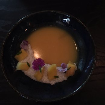 Old Thousand - Mango pudding with tapioca, coconut milk, mango and edible (interestingly) flower. Probably inspired by HK/Cantonese style mango pudding - Cocktail Bars Near Me - Austin, Texas Old Thousand - Mango pudding with tapioca, coconut milk, mango and edible (interestingly) flower. Probably inspired by HK/Cantonese style mango pudding - Cocktail Bars Near Me - Austin, Texas