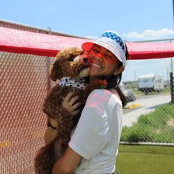 A Box Of Barks - One of our employees and Jasper during our 4th of July Bash